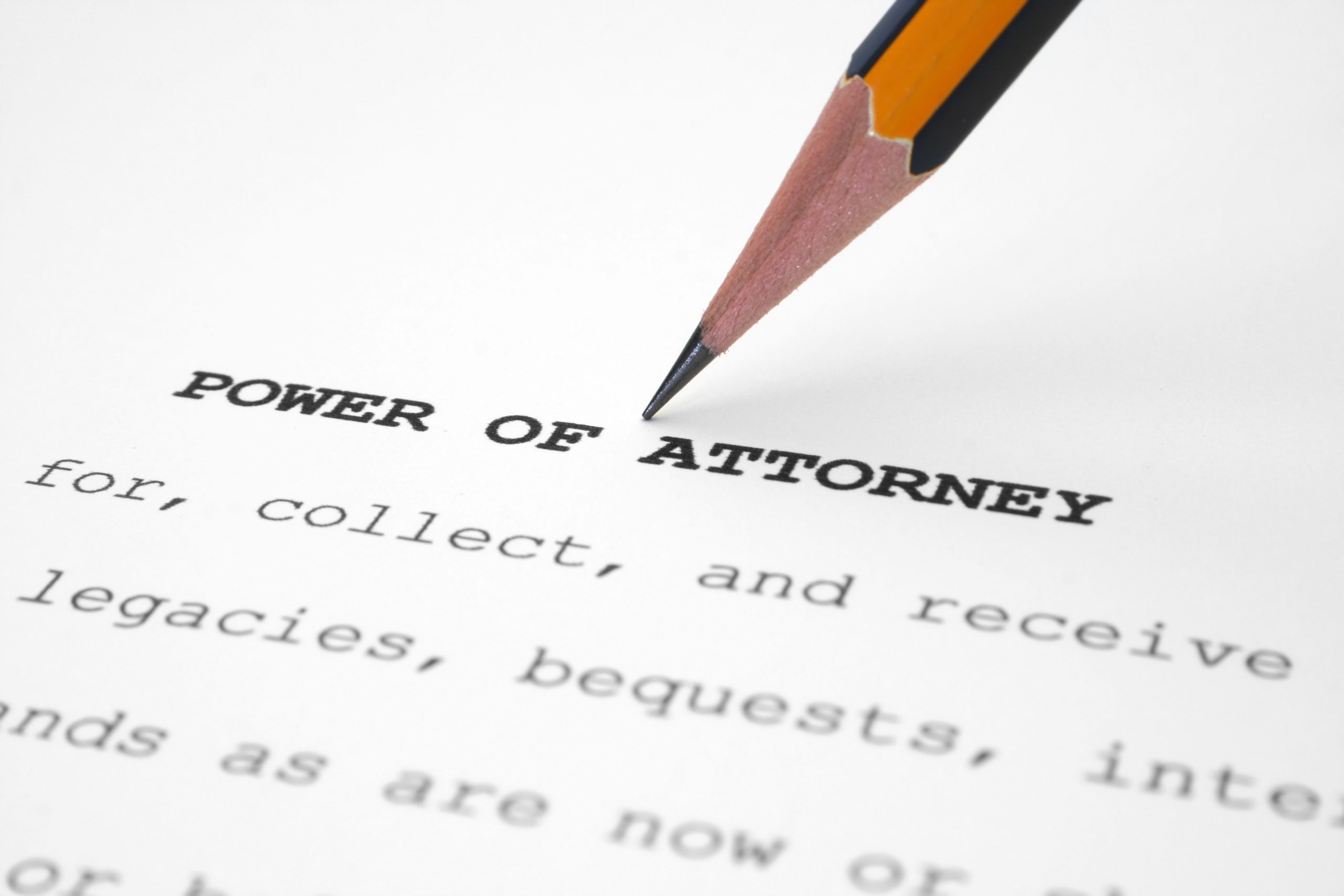 Close-up of a legal document labeled 'Power of Attorney,' with a pencil symbolizing legal assistance for setting up lasting power of attorney at Astraea Linskills Solicitors Liverpool.